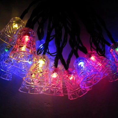 Détail d'une cloche de Noël multicolore lumineuse solaire
