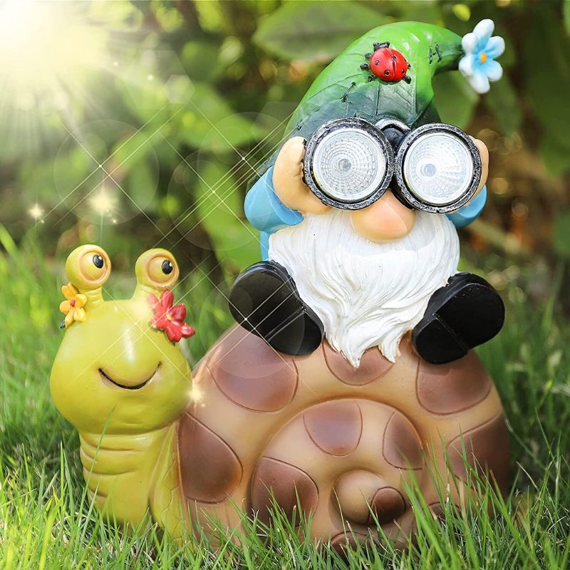 https://cdn.shopify.com/s/files/1/0271/8731/4772/files/Escargotsolaireavecnaindejardin2.jpg?v=1706651836