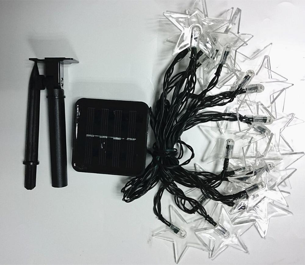 https://cdn.shopify.com/s/files/1/0271/8731/4772/products/Guirlande_Lumineuse_Solaire_Etoile.jpg?v=1584822338