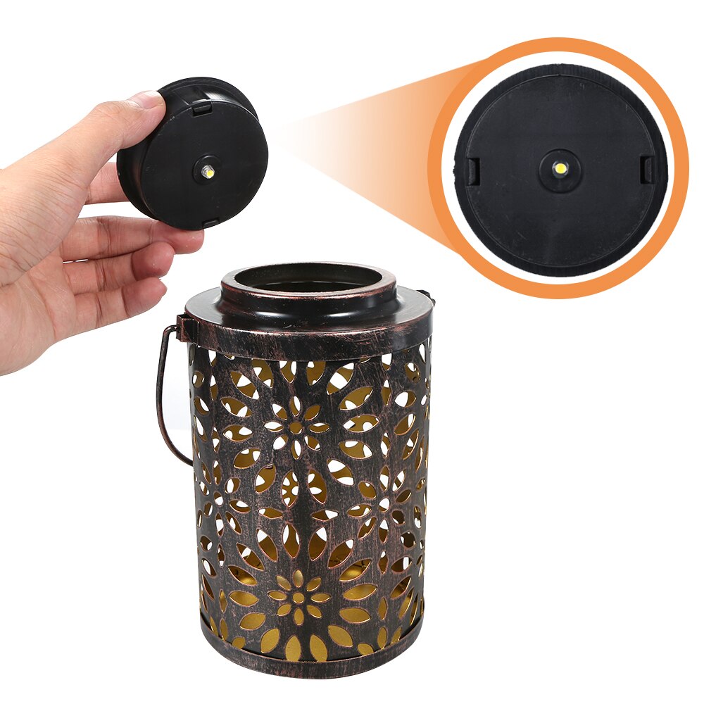 https://cdn.shopify.com/s/files/1/0271/8731/4772/products/Lanterne-solaire-fer-fleurs-2.jpg?v=1614782470