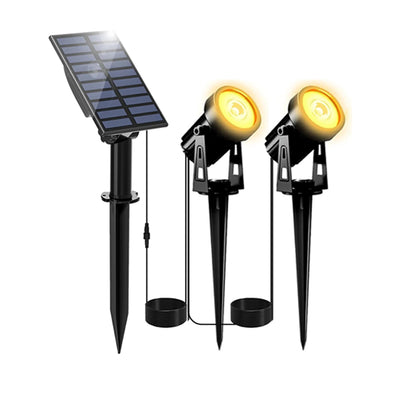 Projecteur solaire LED éclairant un paysage de jardin