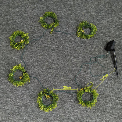 https://cdn.shopify.com/s/files/1/0271/8731/4772/products/couronne-de-noel-solaire_0.jpg?v=1584822381