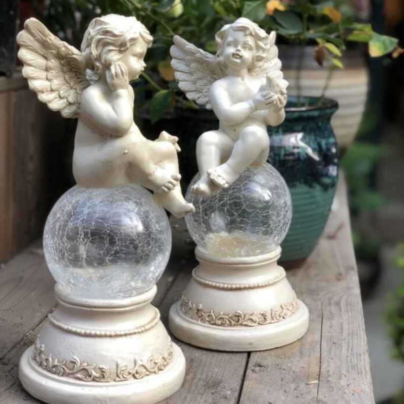 https://cdn.shopify.com/s/files/1/0271/8731/4772/files/lampe-solaire-ange-5.jpg?v=1707255244