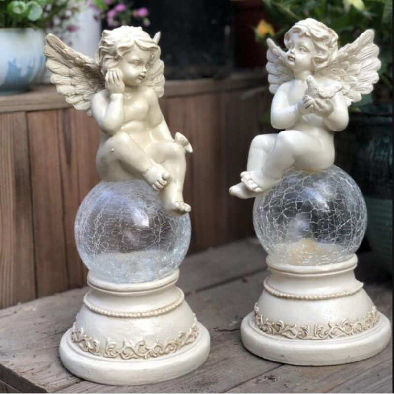 https://cdn.shopify.com/s/files/1/0271/8731/4772/files/lampe-solaire-ange-6.jpg?v=1707255546