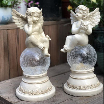 https://cdn.shopify.com/s/files/1/0271/8731/4772/files/lampe-solaire-ange-6.jpg?v=1707255546