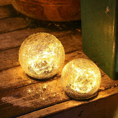 https://cdn.shopify.com/s/files/1/0271/8731/4772/products/lampe-solaire-boule-verre-craquele___14.jpg?v=1598280217