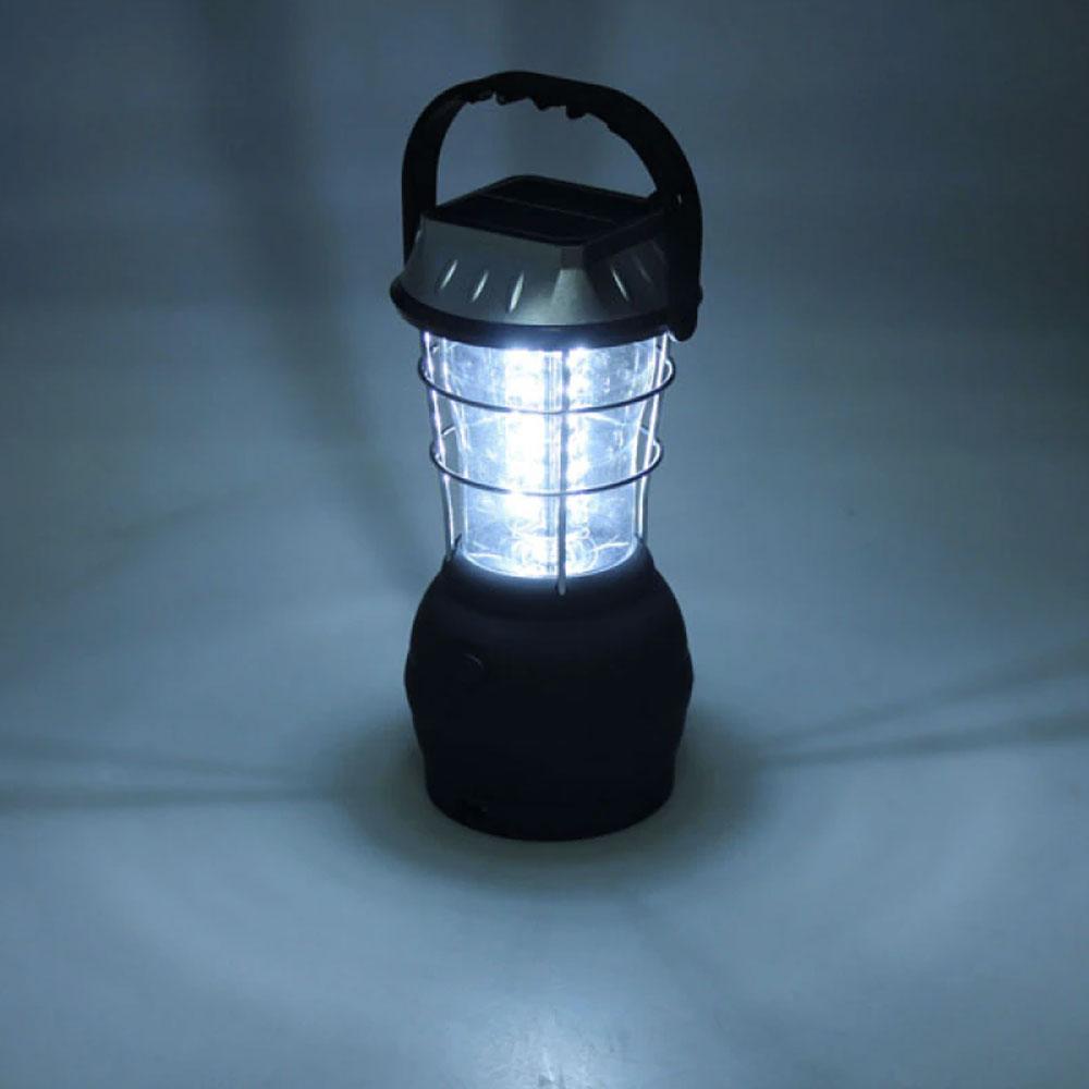https://cdn.shopify.com/s/files/1/0271/8731/4772/products/lampe-solaire-camping-noire-argentee_4_2125b794-15ec-4130-9c46-1d825e0d0b35.jpg?v=1584822522
