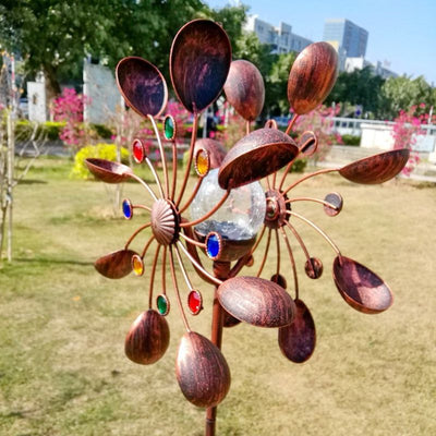 https://cdn.shopify.com/s/files/1/0271/8731/4772/files/moulin-a-vent-jardin-exterieur-metal-2.jpg?v=1707756895