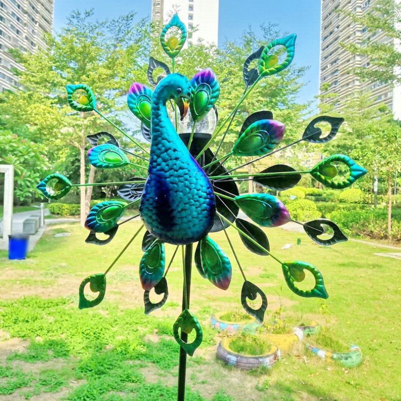 https://cdn.shopify.com/s/files/1/0271/8731/4772/files/paon-solaire-metal-lumineux-moulin-a-vent-4.jpg?v=1707712004