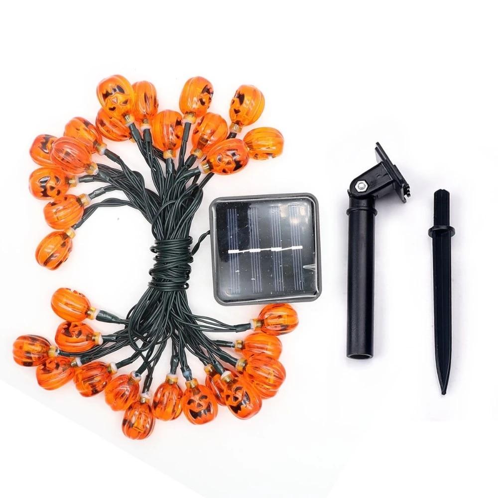 Guirlande solaire citrouilles suspendue en extérieur