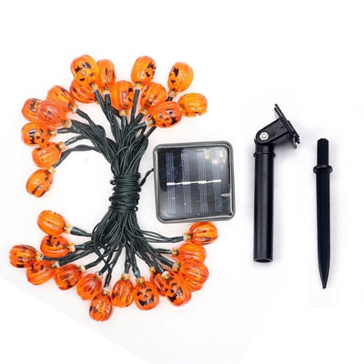 Guirlande solaire citrouilles suspendue en extérieur