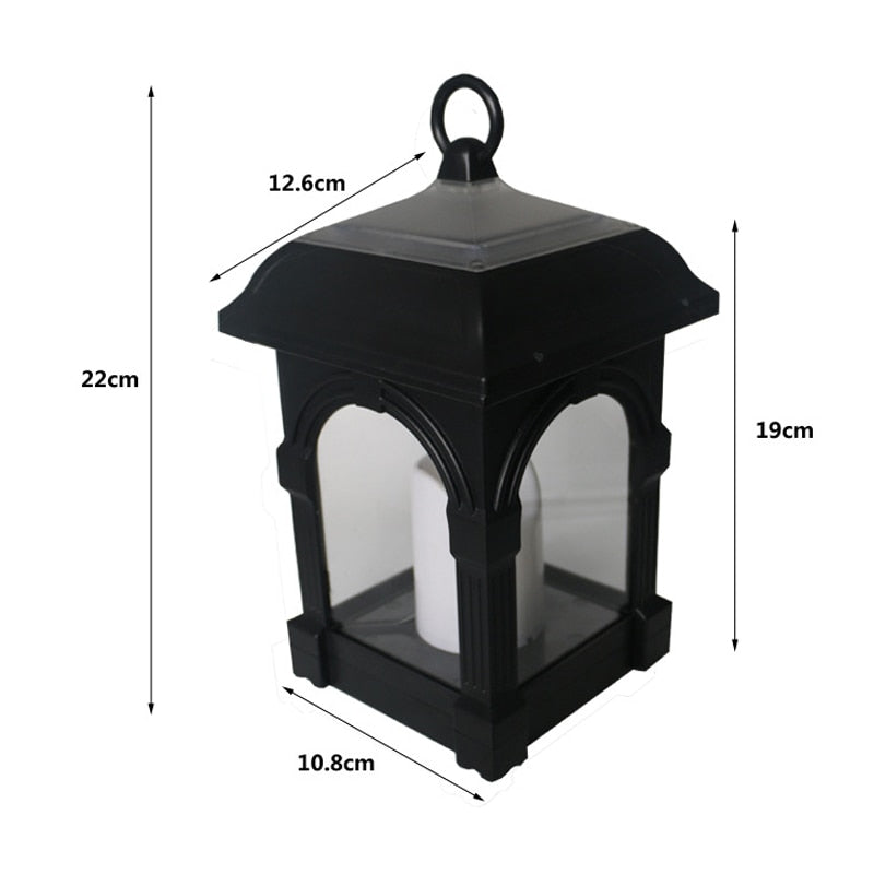 Lanterne solaire bougie vintage posée en extérieur