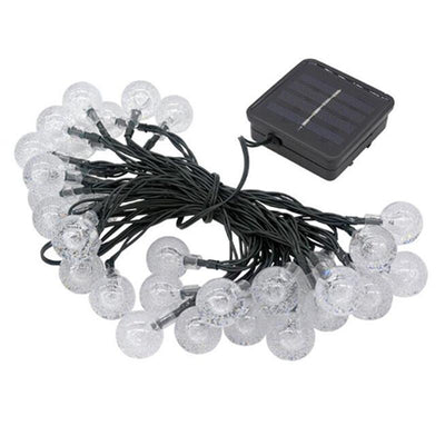 Guirlande solaire boules bulle jaunes allumée la nuit