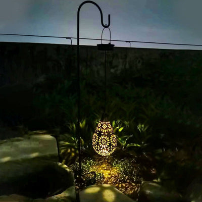 https://cdn.shopify.com/s/files/1/0271/8731/4772/products/Lanterne-solaire-fer-fleurs-creuse-2.jpg?v=1614782182