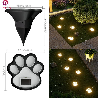 Lampe solaire patte de chien éclairant un jardin la nuit