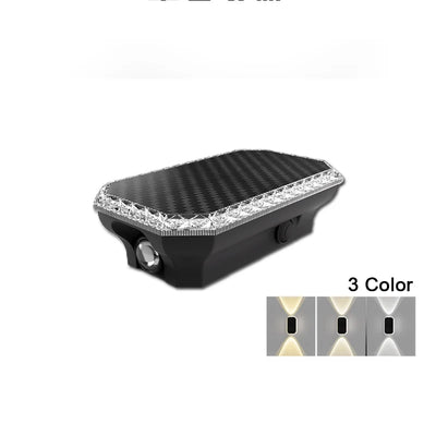Applique solaire murale RGB éclairant un mur la nuit