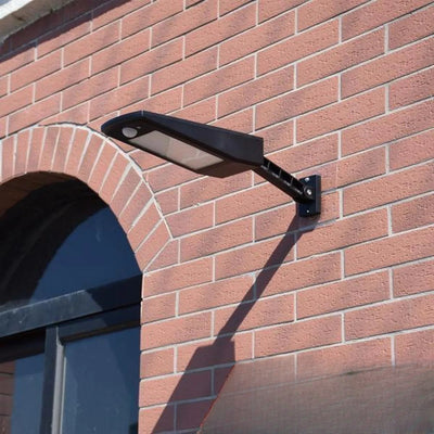 Applique solaire murale LED installée sur mur
