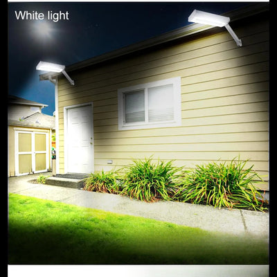 Applique solaire orientable en lumière blanche sur un mur