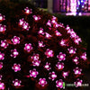 GUIRLANDE SOLAIRE LED FLEURS 7M - ROSE