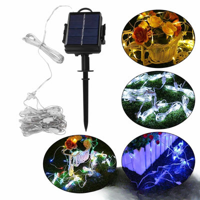 Guirlande Solaire pour Parasol LED Extérieure Étanche – installée sur un parasol, ambiance de nuit