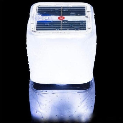 https://cdn.shopify.com/s/files/1/0271/8731/4772/products/lampe-gonflable-solaire-mini-3_2.jpg?v=1584822523