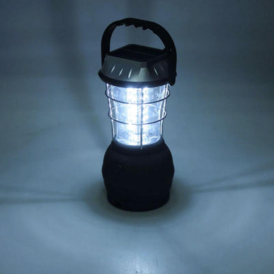 https://cdn.shopify.com/s/files/1/0271/8731/4772/products/lampe-solaire-camping-noire-argentee_4_2125b794-15ec-4130-9c46-1d825e0d0b35.jpg?v=1584822522
