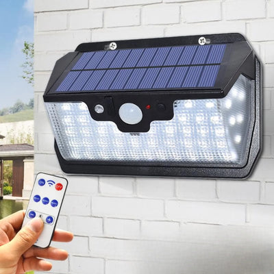 Lampe solaire LED murale allumée avec télécommande