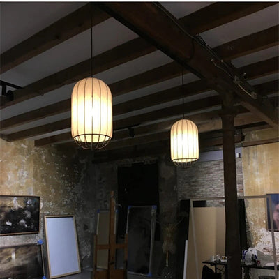 https://cdn.shopify.com/s/files/1/2499/8120/files/lustre-moderne-nordique-en-tissu-pour-int-rieur-style-pur-1.jpg?v=1728492632