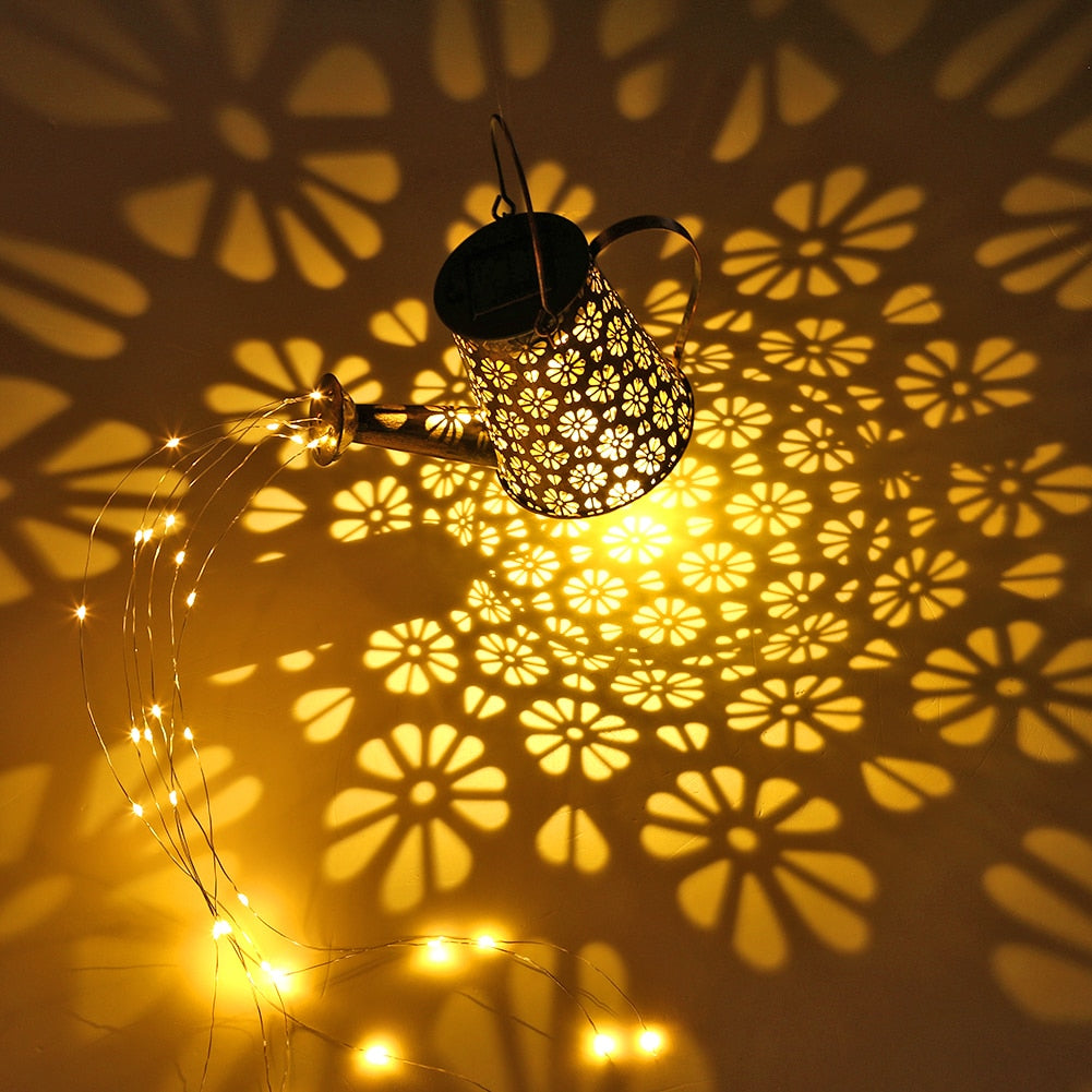 Arrosoir lumineux solaire métal motif fleur pour jardin