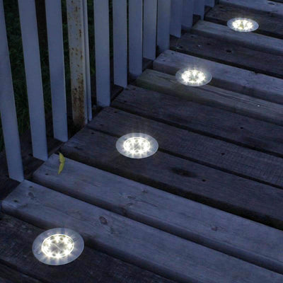 https://www.magic-solaire.com/wp-content/uploads/2021/10/spot-solaire-encastrable-extra-plat-terrasse-bois.jpg